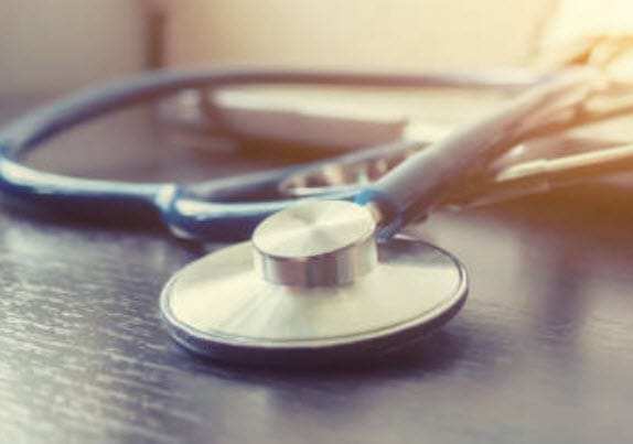 Stethoscope symbolizing the importance of professional plumbers in preventing health hazards caused by plumbing issues